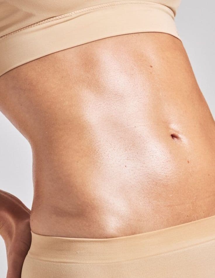 Toned, sculpted midsection after Eleve Health premium body sculpting