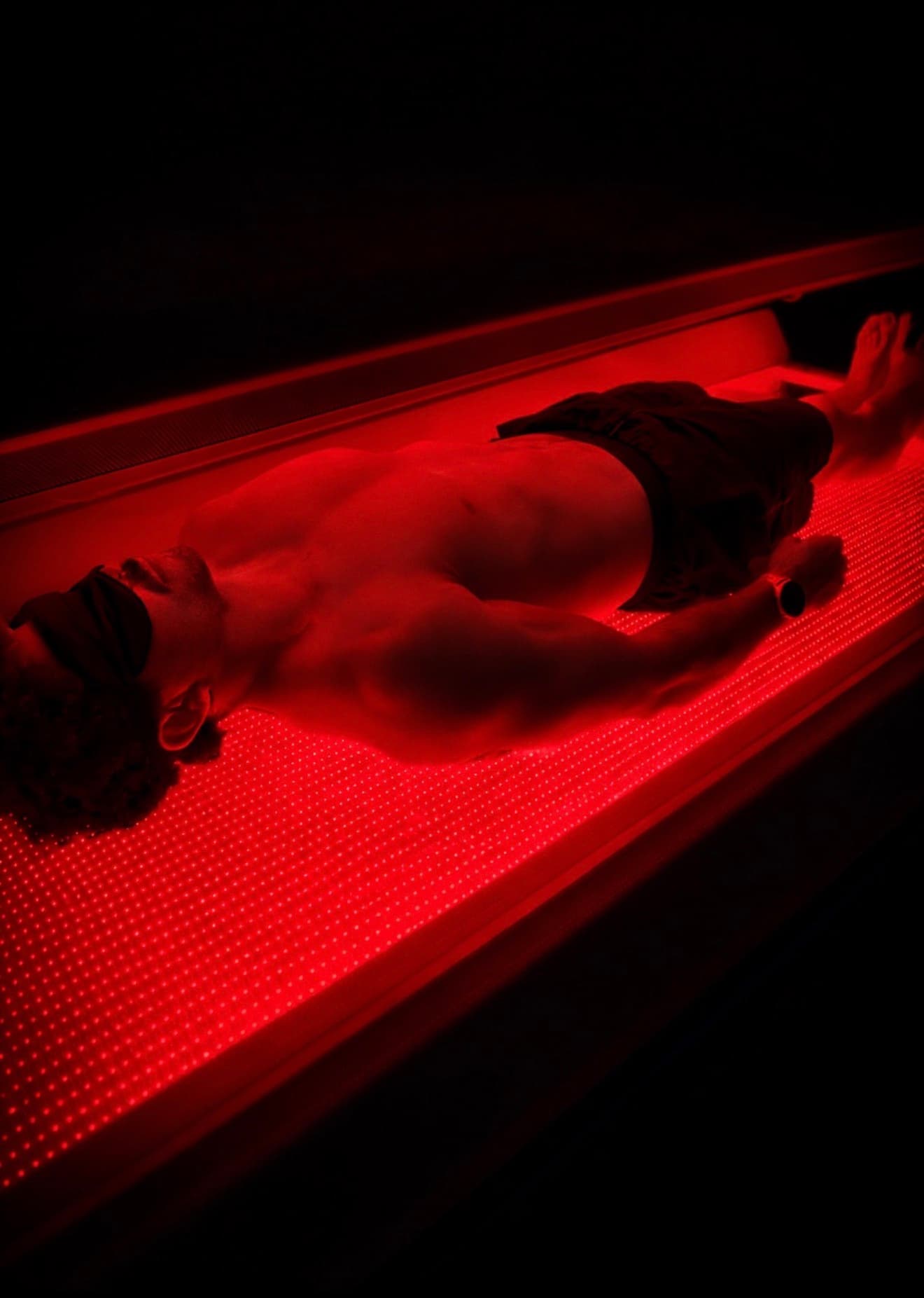 Man receiving red light therapy at Eleve